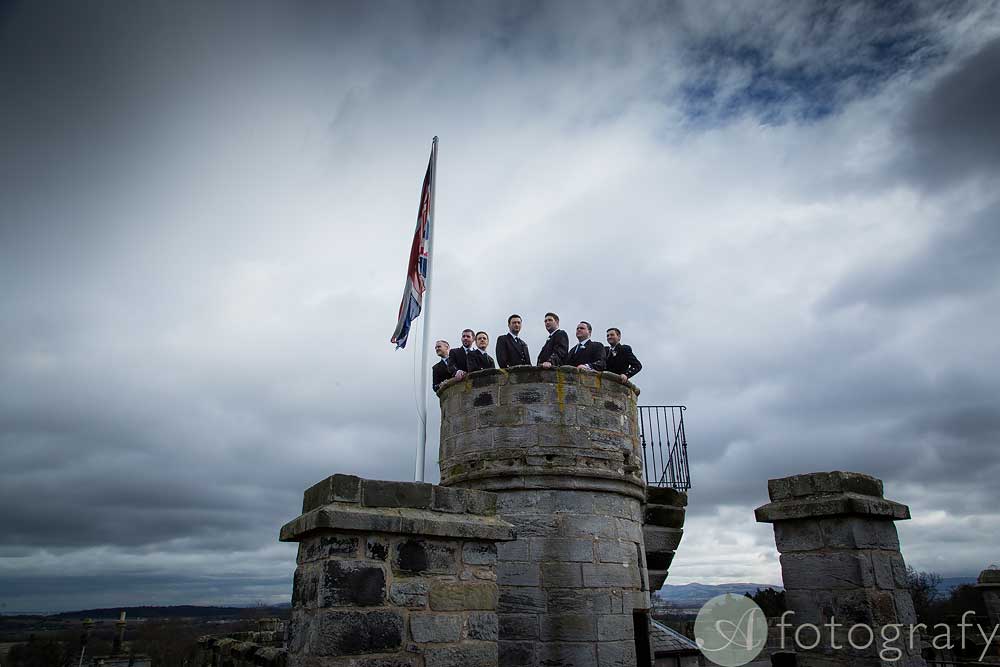 Dundas castle wedding photos with groomsmen on the rooftop